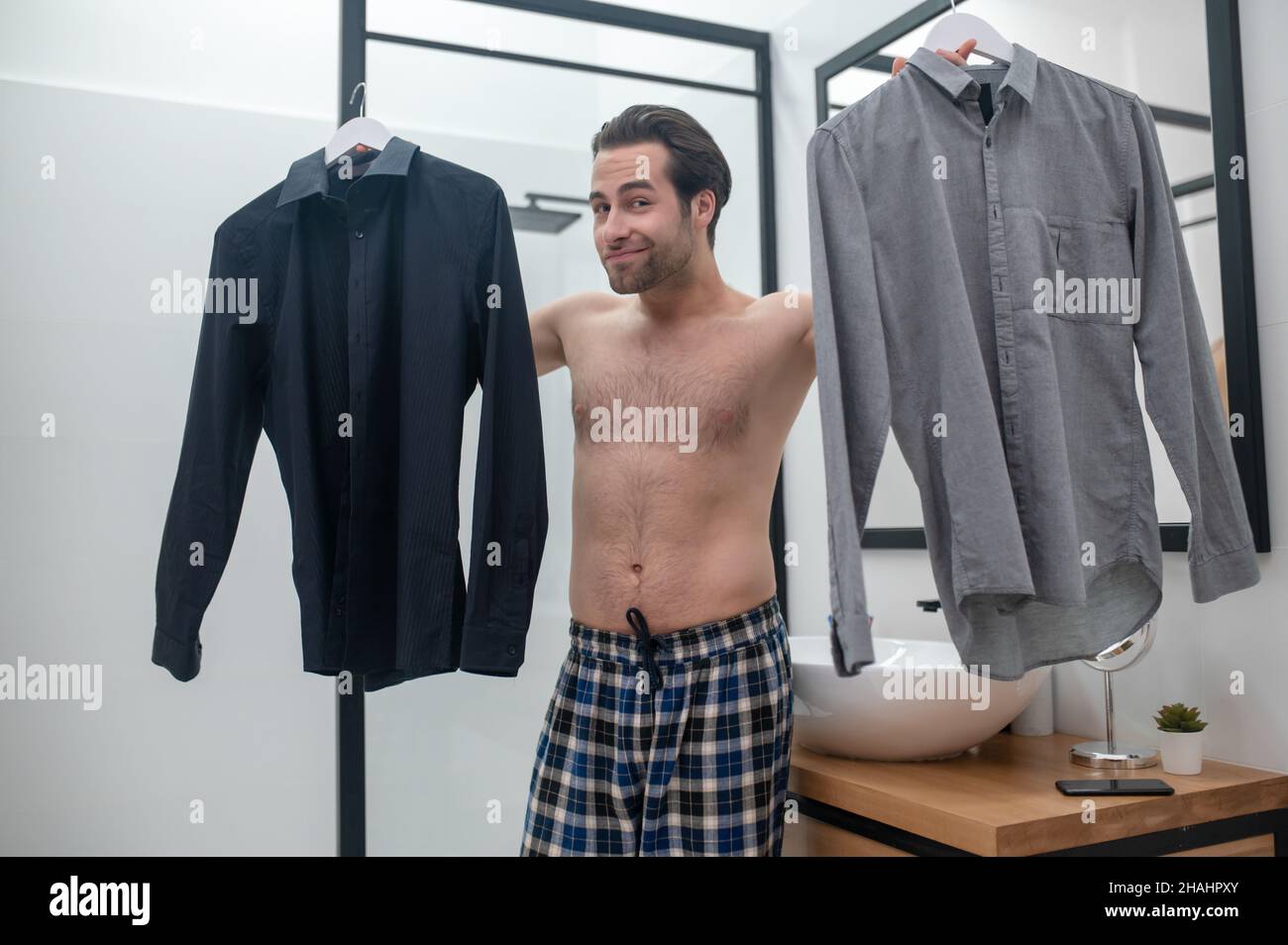 Hesitating hi-res stock photography and images - Alamy