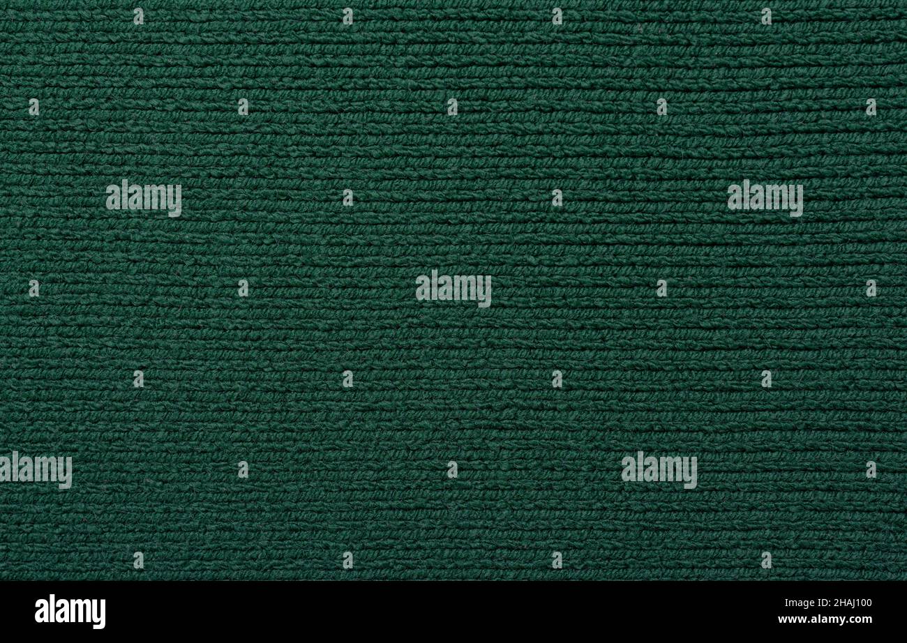 Knitted fabric texture. The pattern is clearly visible. Stock Photo