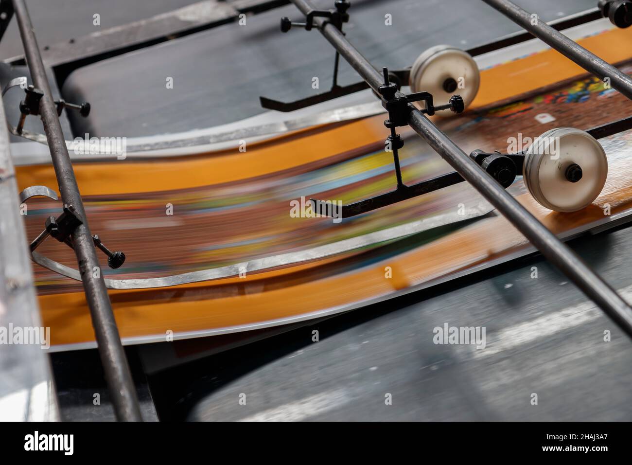 Work Inside Machine Tip Industrial machinery at work inside a facility Stock Photo - Alamy