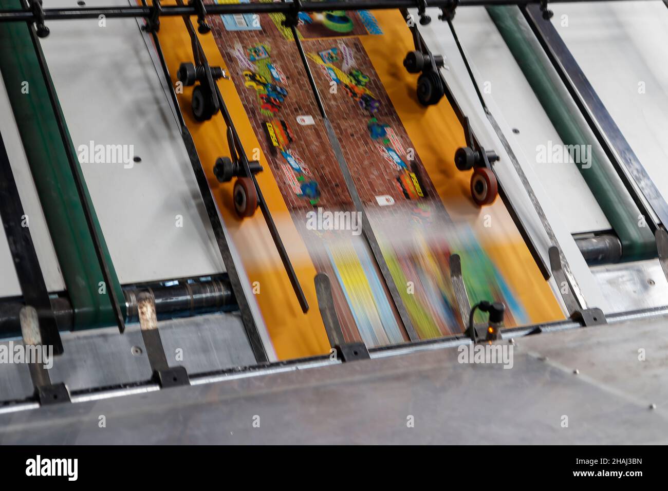 Work Inside Machine Tip Industrial machinery at work inside a facility Stock Photo - Alamy