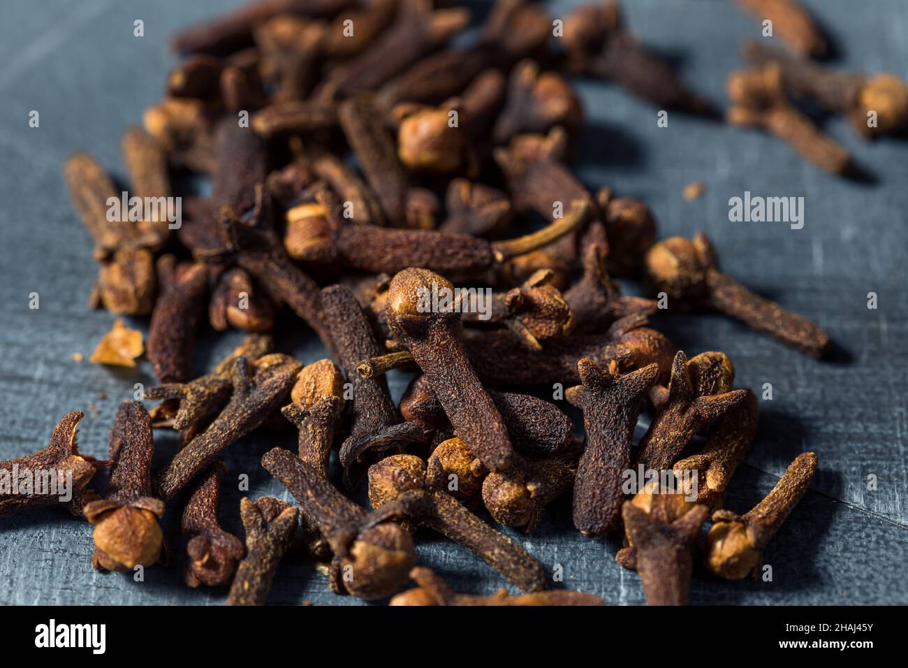 Dry Organic Whole Cloves in a Bowl Stock Photo Alamy