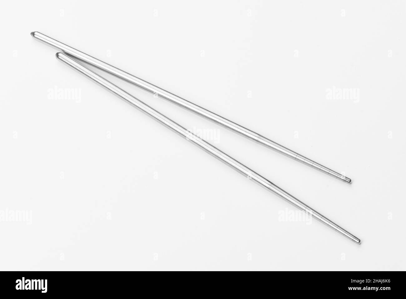 Beautiful sticks for sushi isolated on a white background. Cutlery on a ...