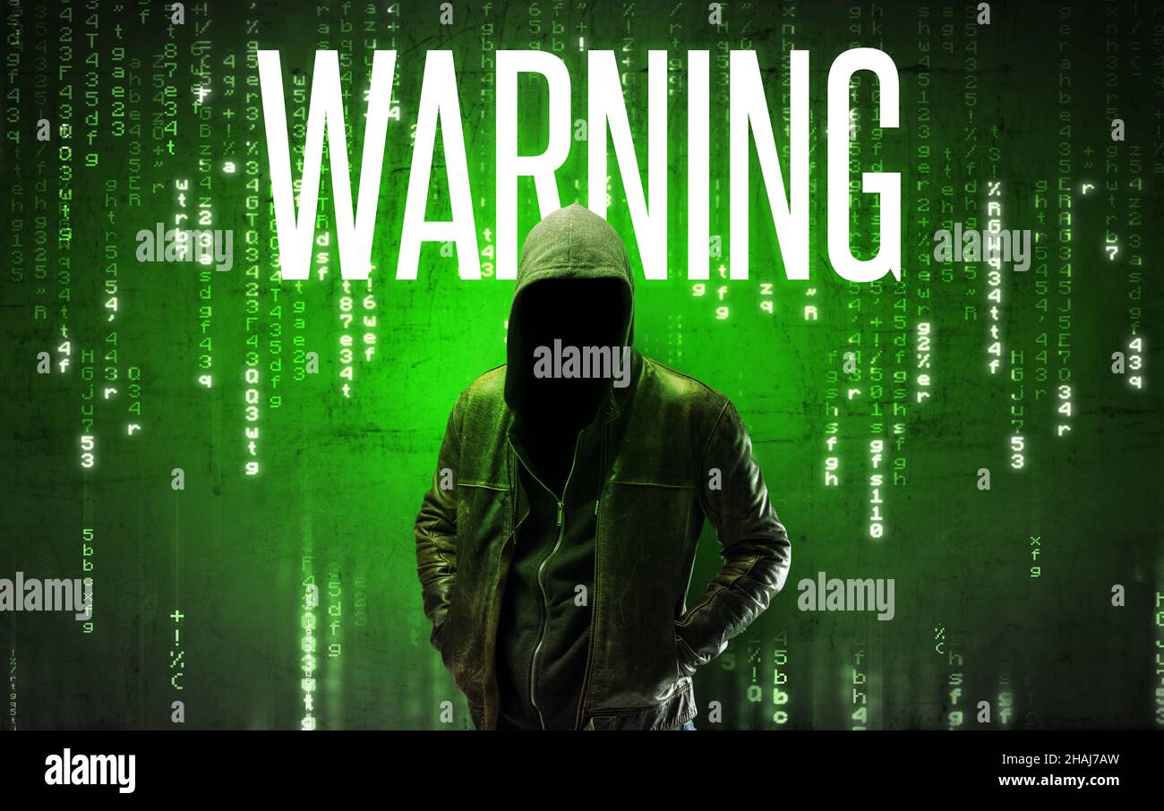 Faceless hacker with WARNING inscription, hacking concept Stock Photo ...