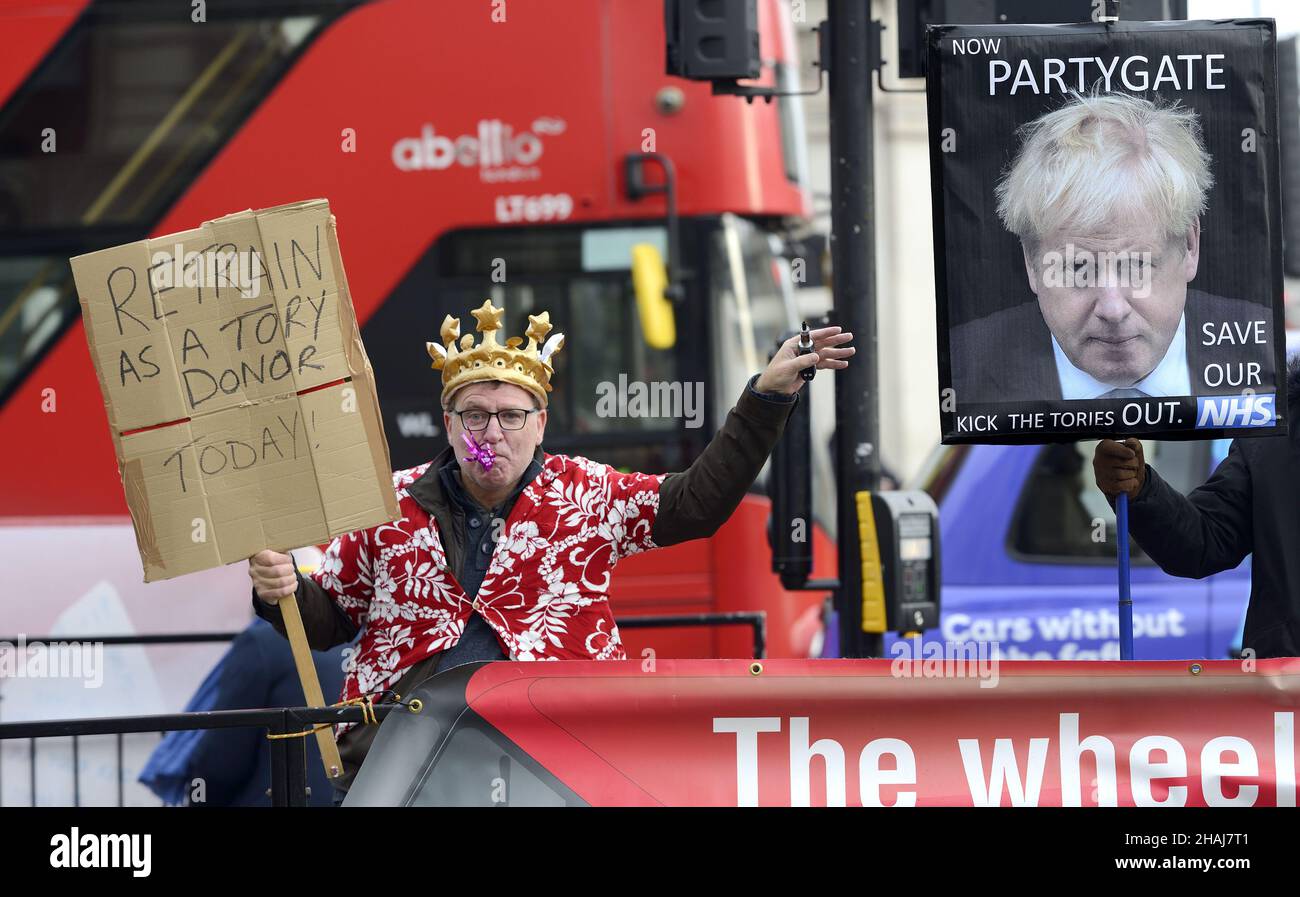 London, UK. 8th Dec, 2021. Anti-Government protesters in Parliament Square campaign against the consequences of Brexit and what they see as government Stock Photo