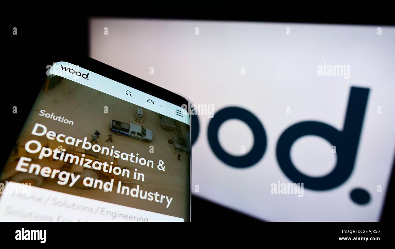 Smartphone with webpage of British engineering company John Wood Group