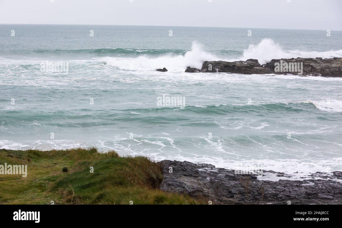 Across The Rocks Waves roll across beach hi-res stock photography and images - Alamy