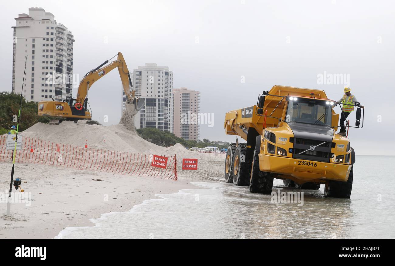 Naples, Naples, USA. 13th Dec, 2021. The second part of the $5 million beach renourishment project at Naples Beach covers roughly 1.3 miles of Vanderbilt Beach where the county plans to haul 118,000 tons of sand to Vanderbilt because more sand hasÂ eroded there. (Credit Image: © Bob Karp/ZUMA Press Wire) Stock Photo