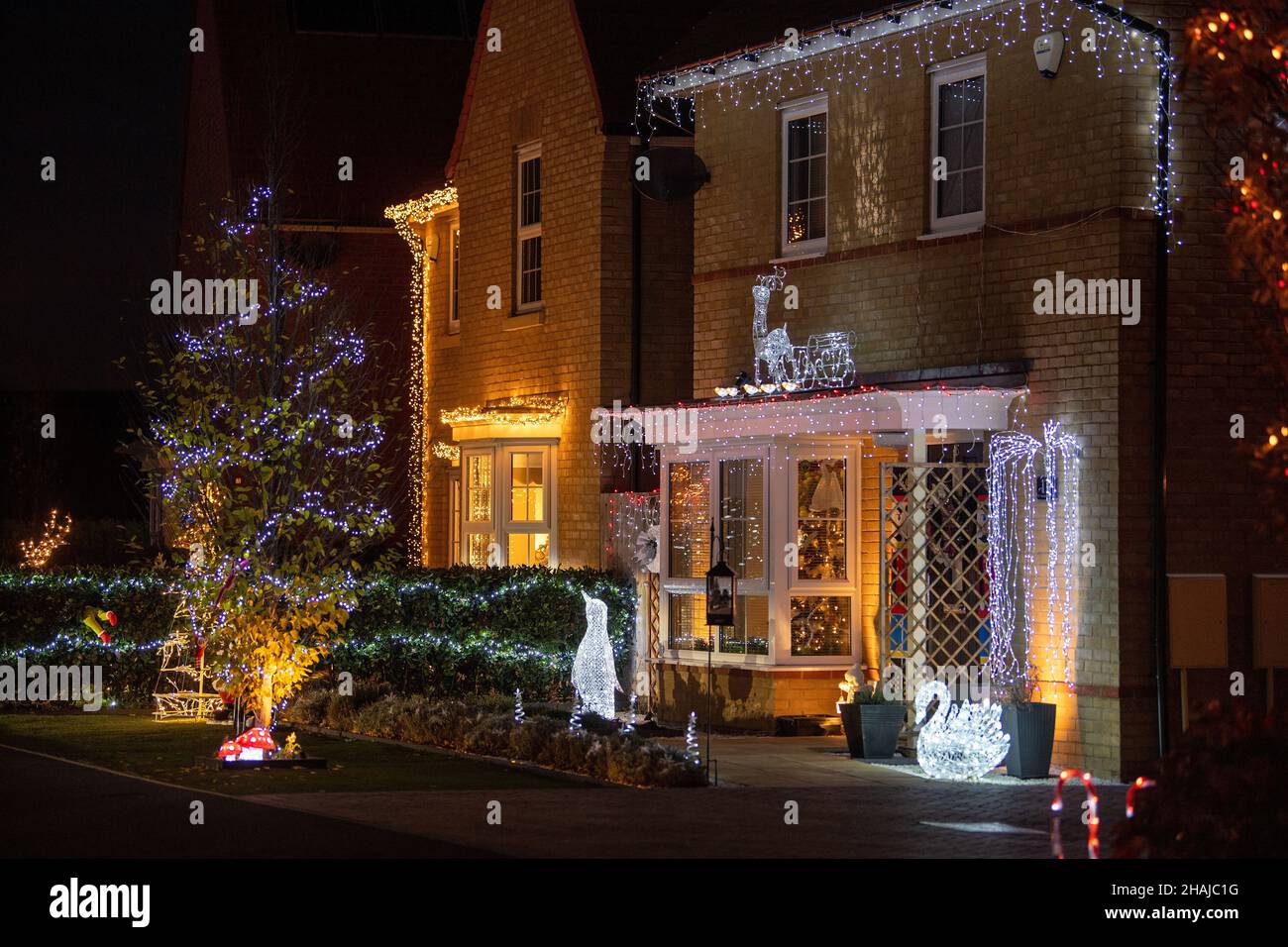 Putting lights on house hires stock photography and images Alamy