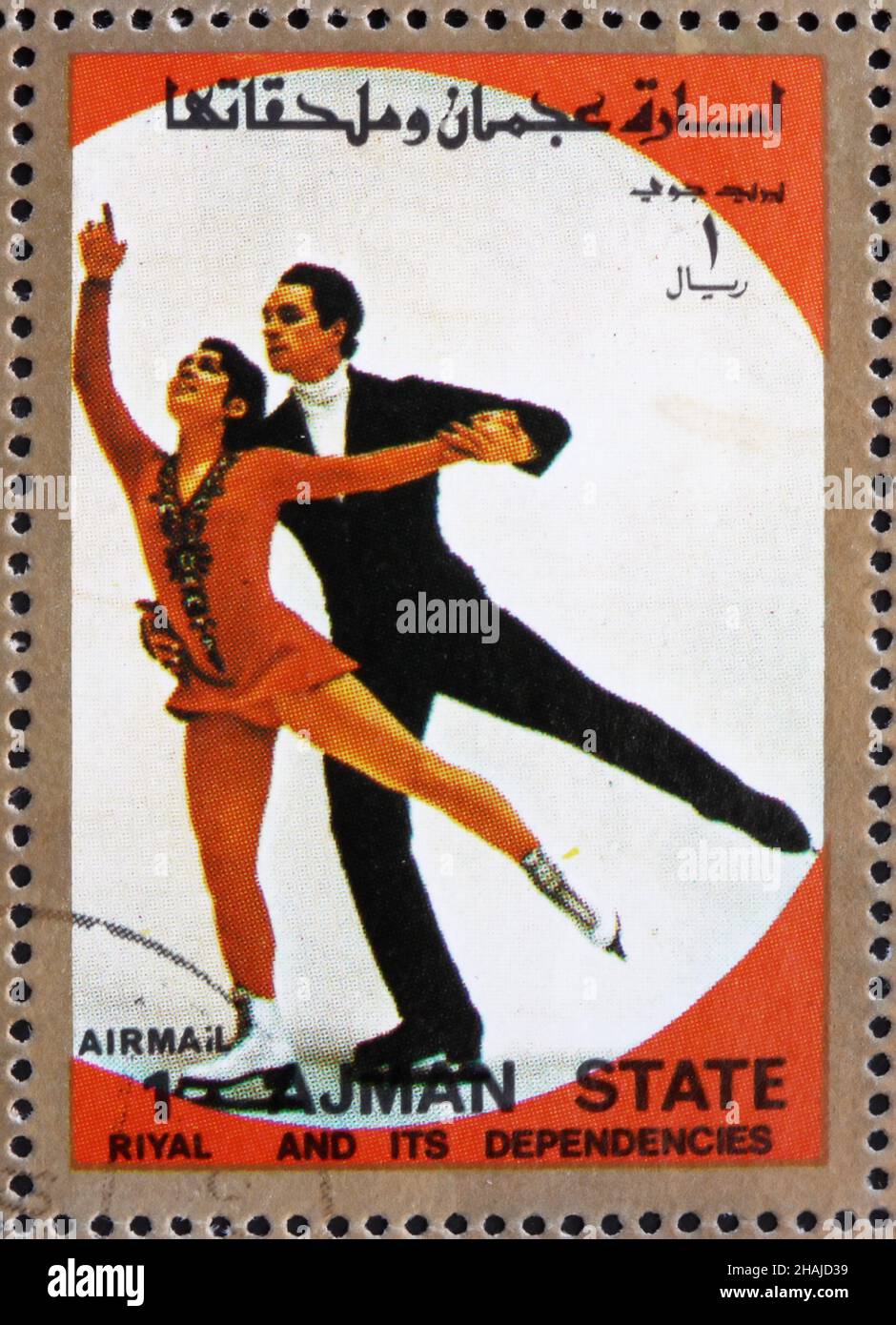 AJMAN - CIRCA 1973: a stamp printed in the Ajman shows Figure Skating, Ice Dancing, Winter Olympics, circa 1973 Stock Photo