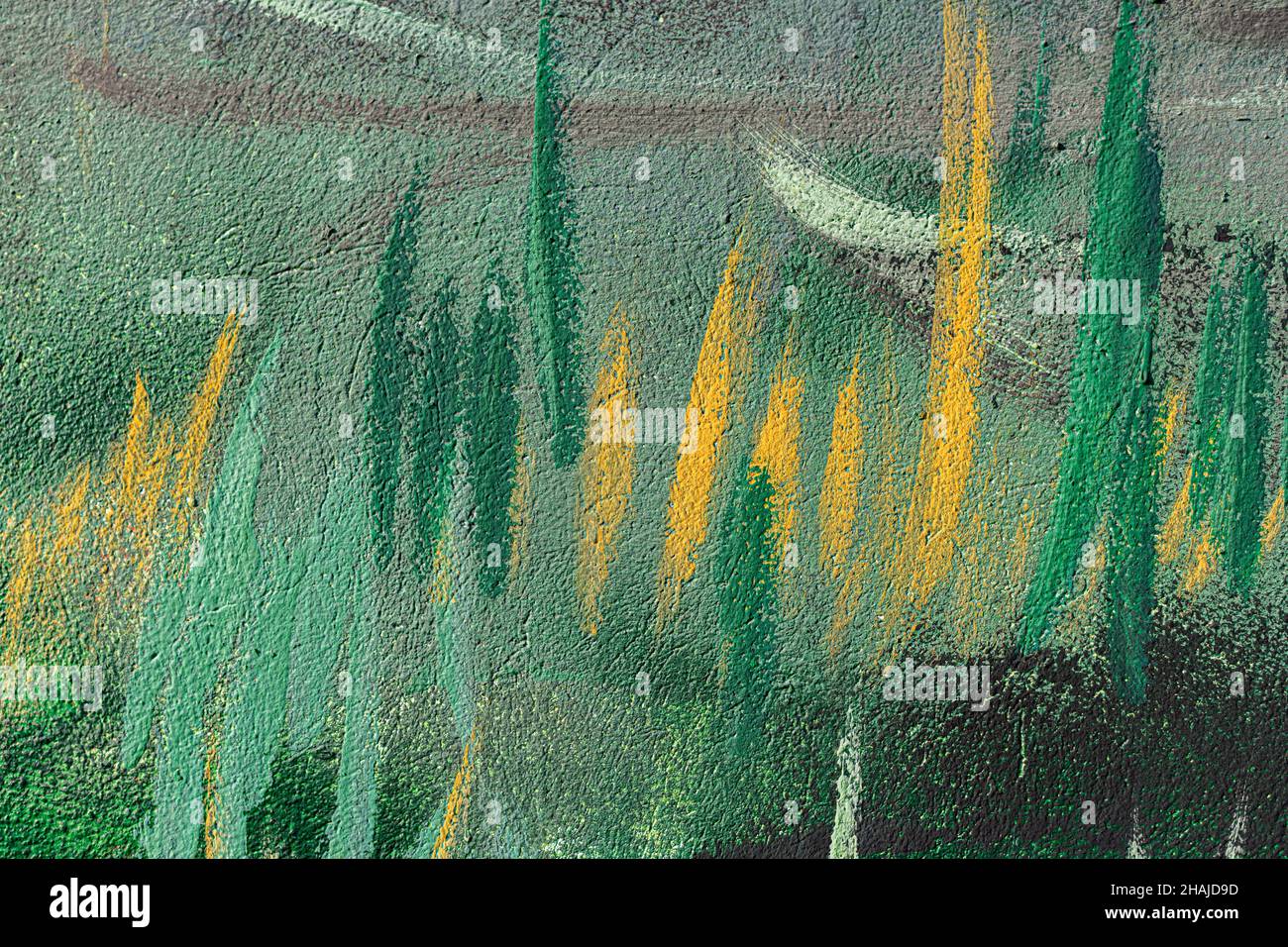 Wall with multi-colored paints as an background. Stock Photo