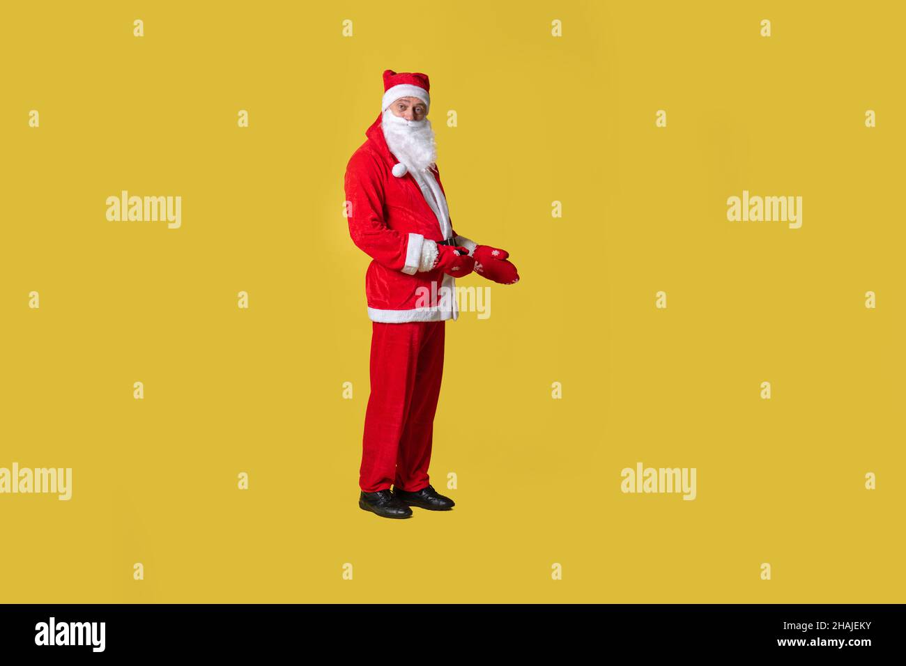 Santa claus yellow funny style, suspenders holiday christmas winter old. Fashionable bearded mature, diet Hands keeps down shows Stock Photo - Alamy Santa claus yellow funny style, suspenders holiday christmas winter old. Fashionable bearded mature, diet Hands keeps down shows Stock Photo - Alamy