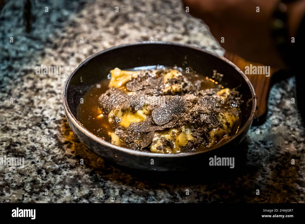 Goose liver ravioli with truffle in Aups, France. In the truffle paradise. Even if the color black now dominates in this dish. Taste it is a blast and a real truffle boost Stock Photo