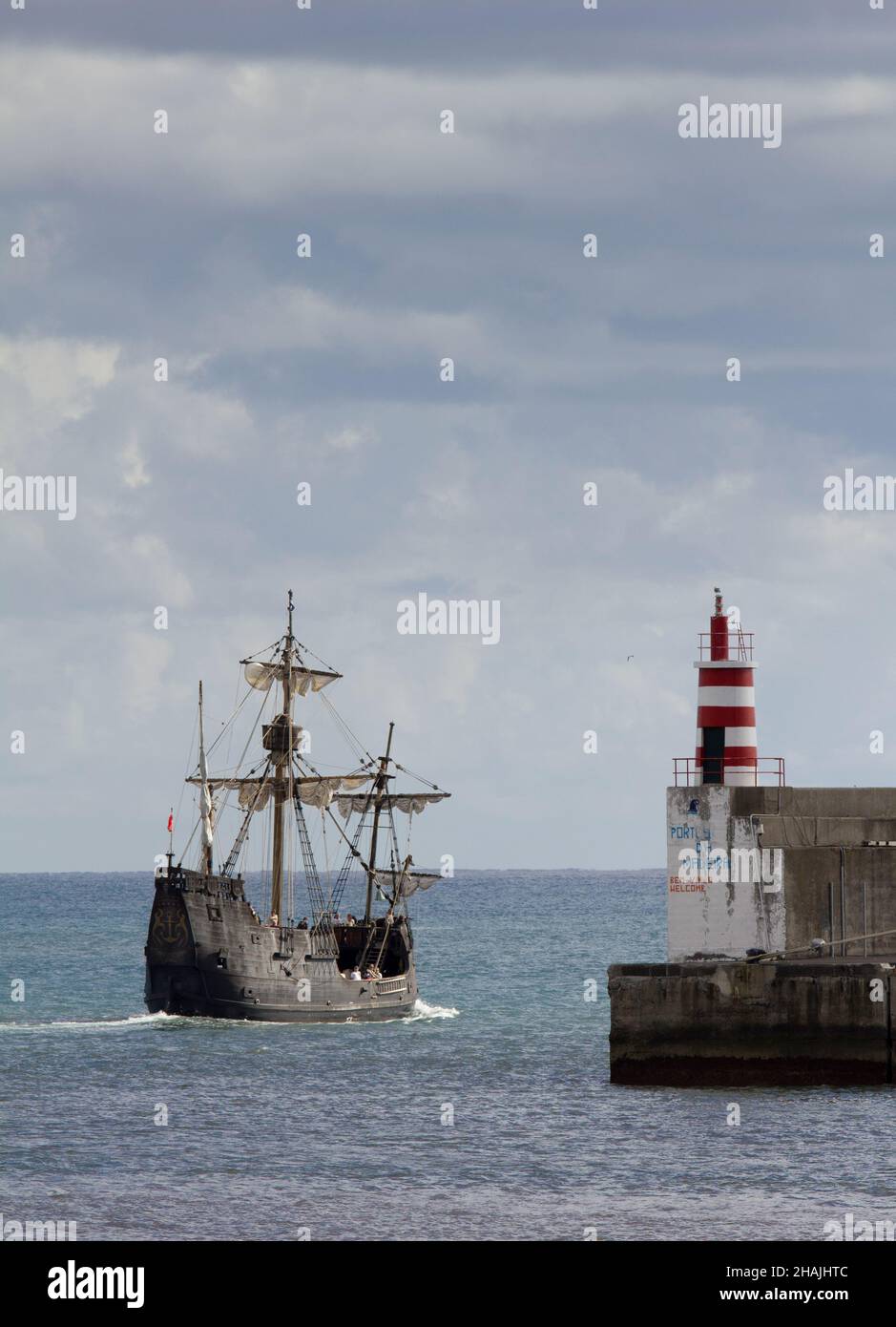 Santa Maria de Colombo replica ship leaving its home port of Funchal, Madeira.  Replica (or as close as believed) of Columbus's ship the Santa Maria. Stock Photo