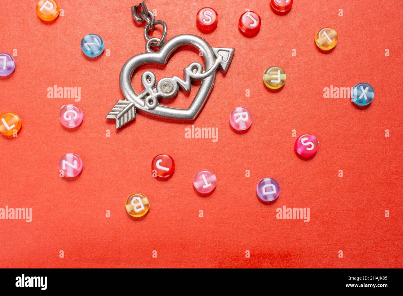 Heart shape and love wording amid colorful alphabet letters Stock Photo ...