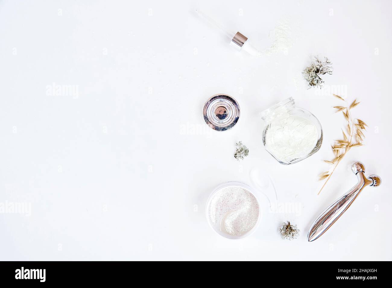 Face care cosmetics set in shape of Christmas tree. Dermatology