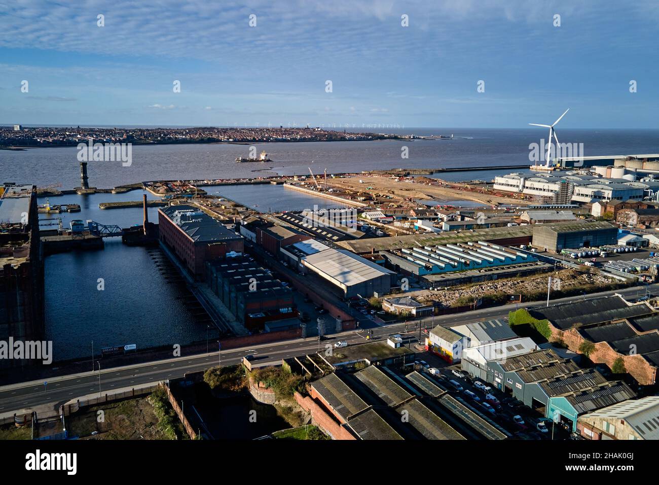 Liverpool, Merseyside, UK - Dec, 02 2021. A general aerial view of Liverpool’s Grade II Listed Waterfront and Tobacco Warehouse with Bramley-Moore Doc Stock Photo