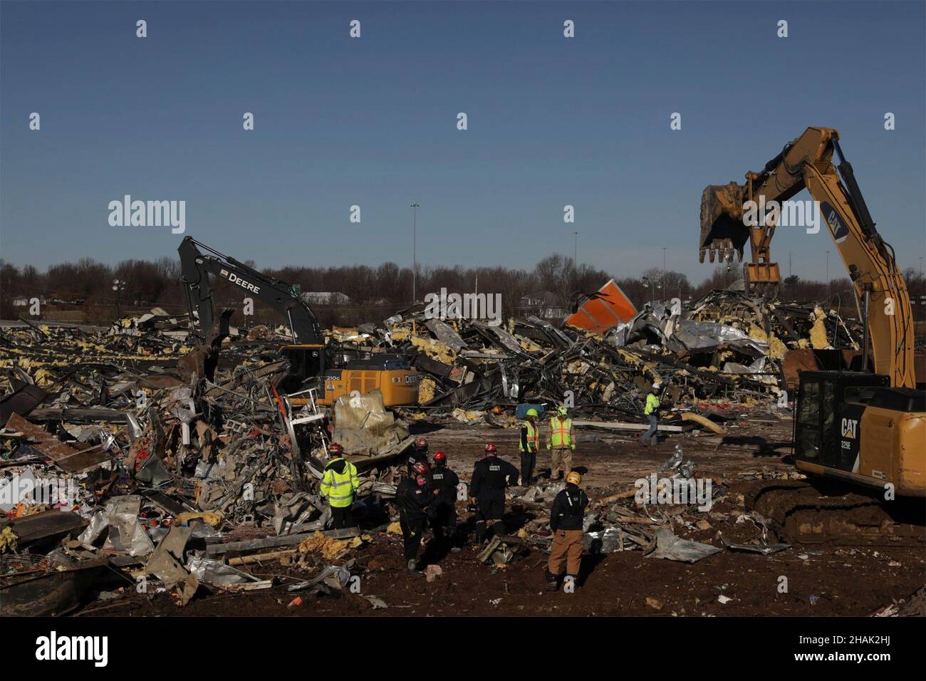 Mayfield, United States Of America. 12th Dec, 2021. Mayfield, United States of America. 12 December, 2021. U.S. Army National Guardsmen assist in clearing debris in the aftermath of devastating tornadoes that swept across four states destroying buildings and killing dozens December 12, 2021 in Mayfield, Kentucky. Credit: Spc. Brett Hornback/U.S. Army/Alamy Live News Stock Photo