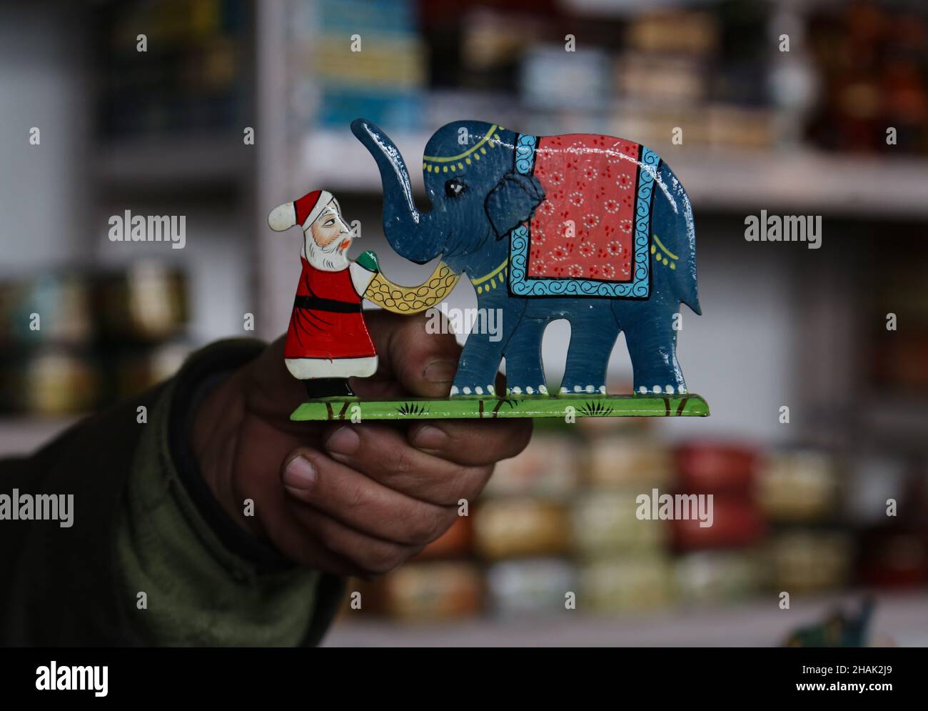 Srinagar, India. 13th Dec, 2021. Kashmiri artisan giving finishing