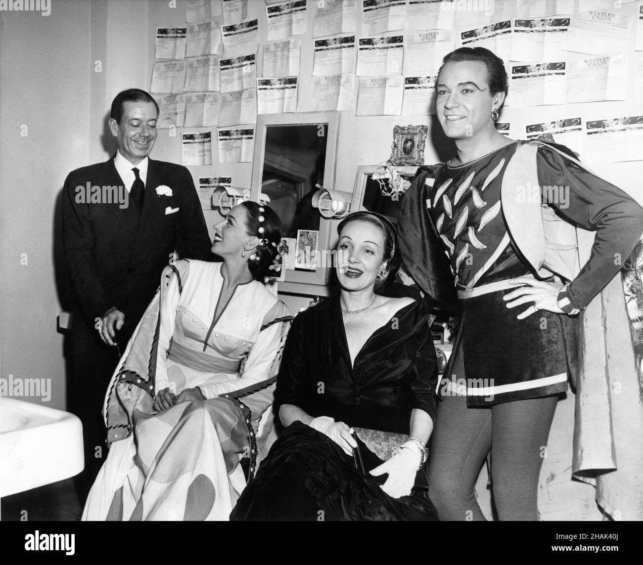 MARLENE DIETRICH visiting Composer COLE PORTER PATRICIA MORISON and ALFRED DRAKE backstage after the opening of the original Broadway production of KISS ME KATE on December 30th 1948 at the New Century Theatre Stock Photo