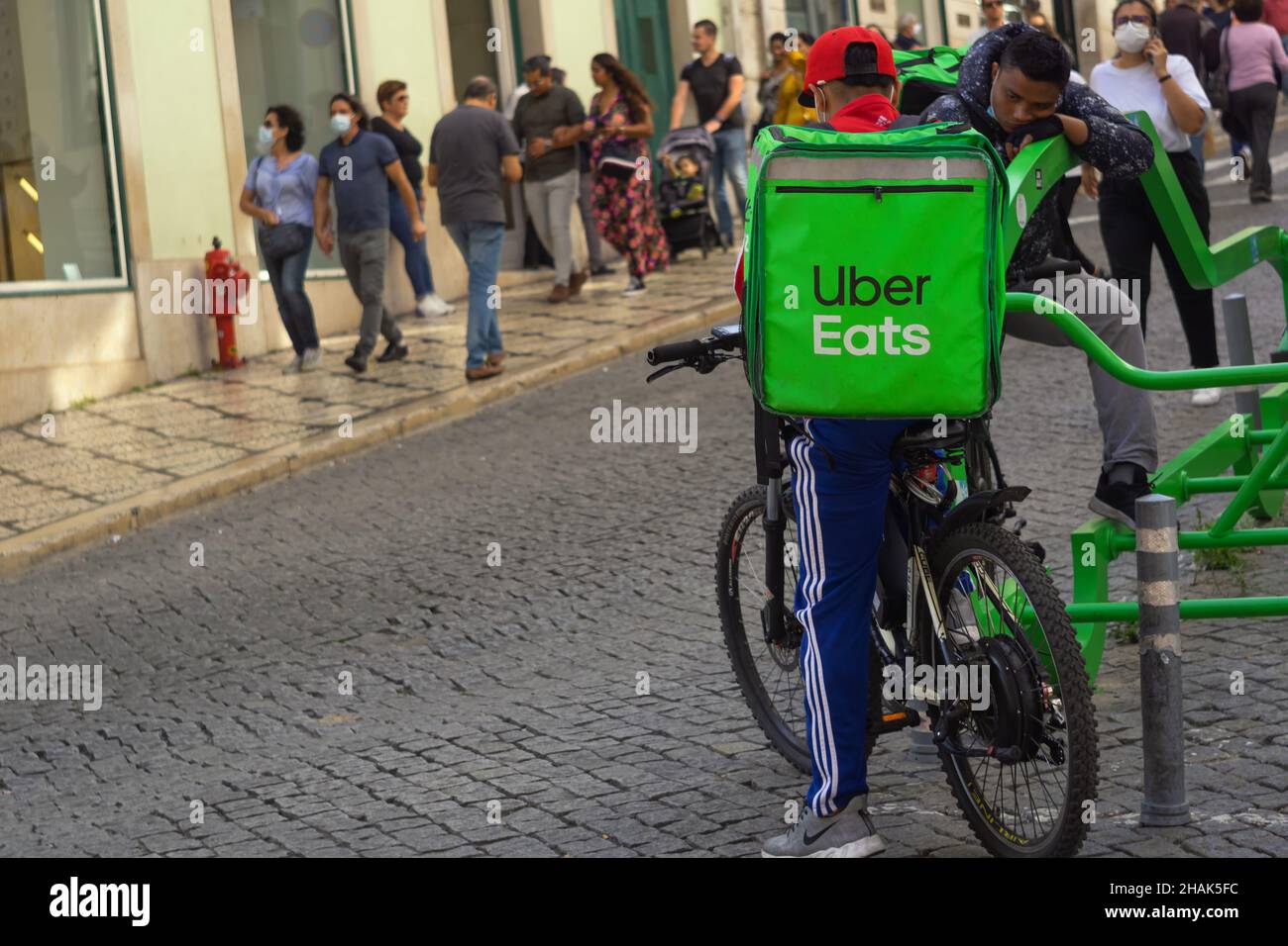 LISBOA, PORTUGAL - Oct 23, 2021: Lisboa,Portugal,October 23,2021:Biaxa Bored Uber drivers were waiting for the next order. Stock Photo