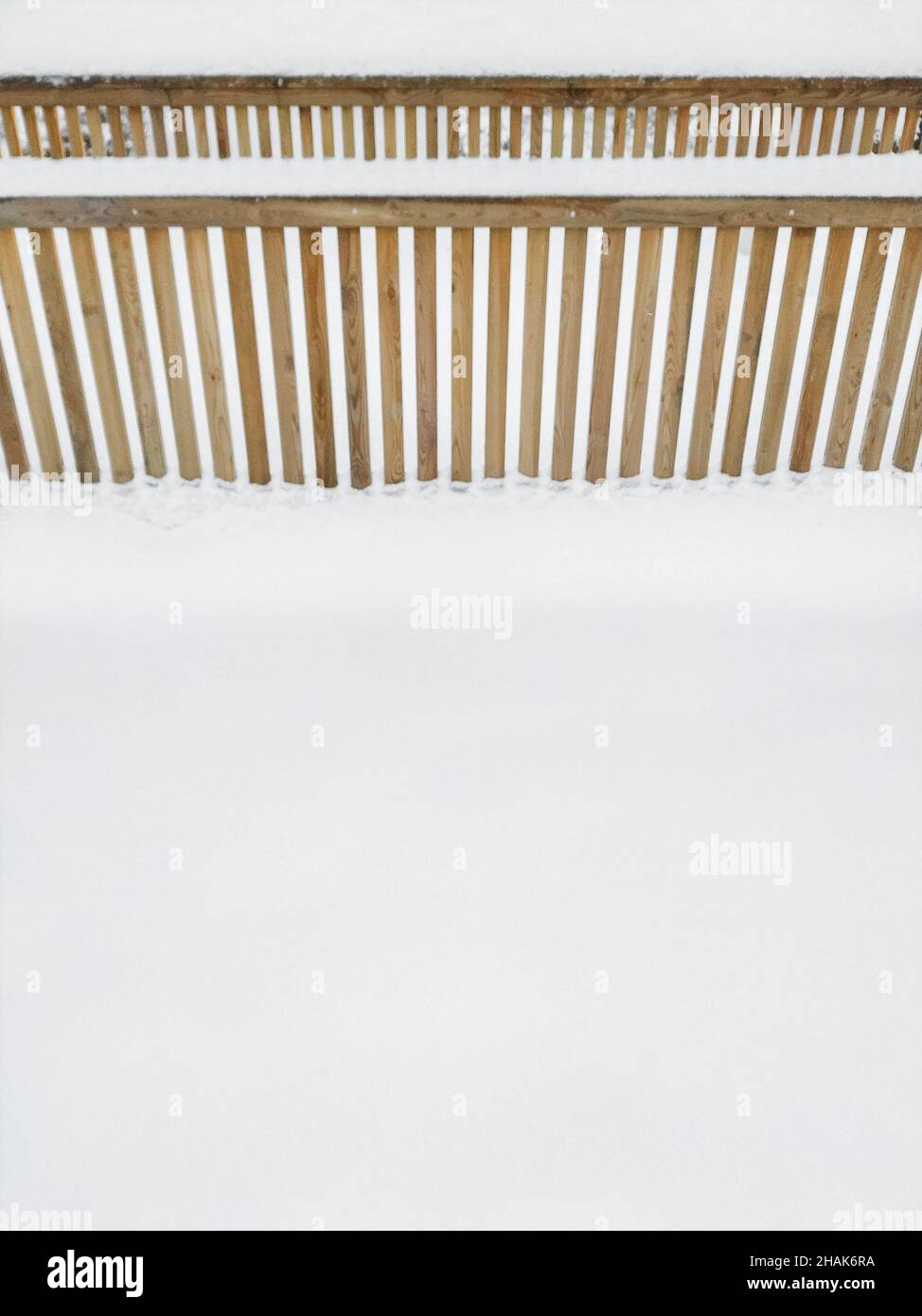 White snow texture background with a wooden fence in winter Stock Photo ...