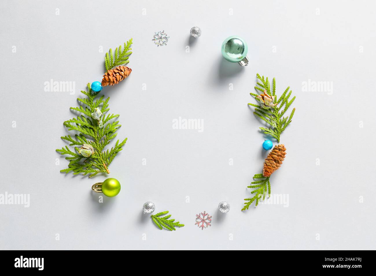 Frame made of fir branches and Christmas decor on white background ...
