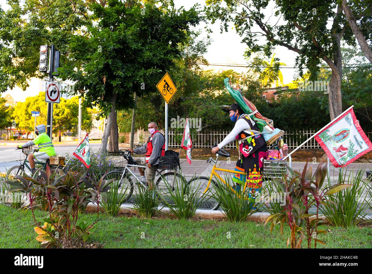 Mexican cyclists on a pilgrimage honouring the Virgin of Guadelupe, Merida Mexico Stock Photo