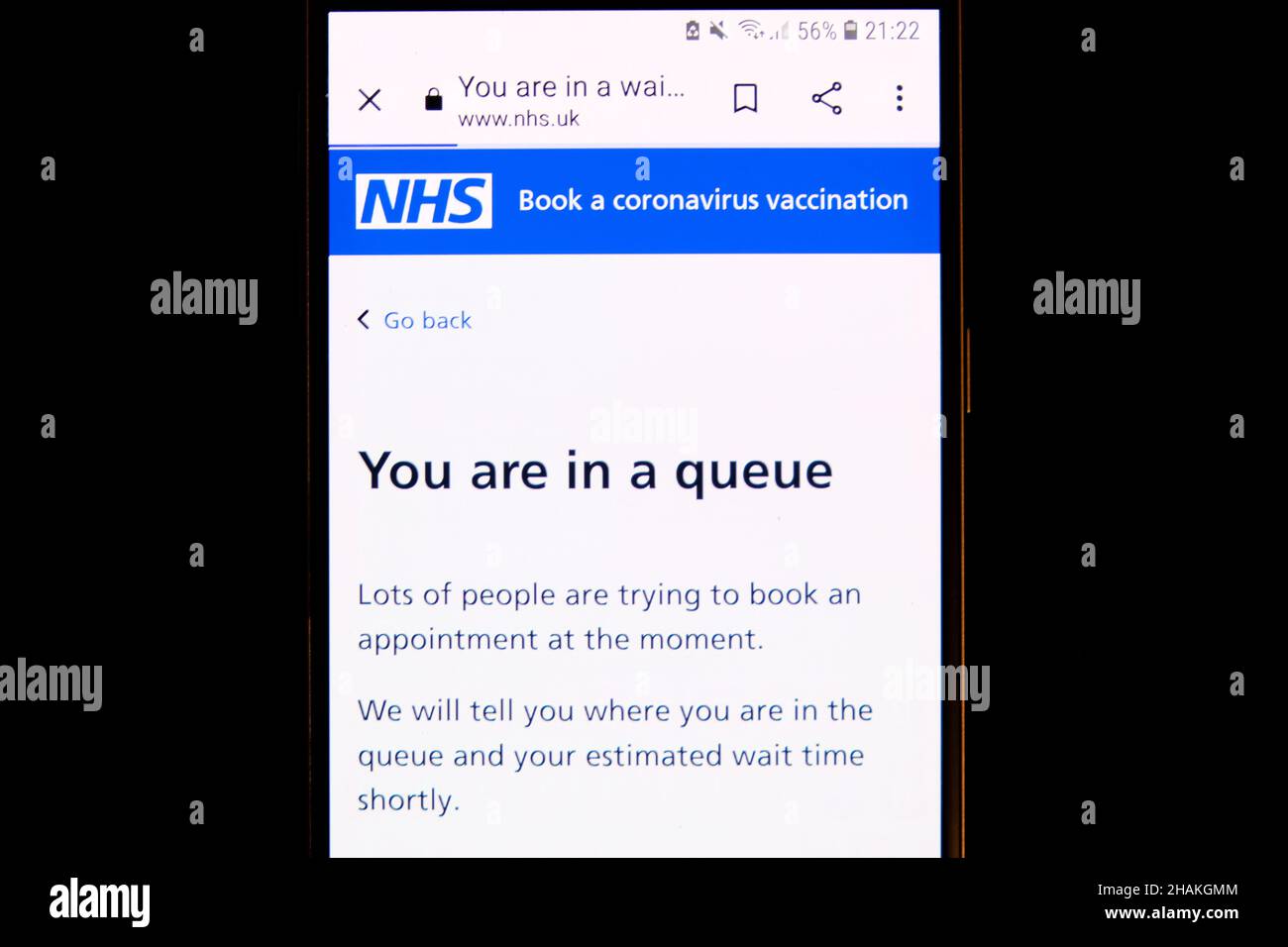 The NHS online site for booking a Covid-19 vaccination sees huge numbers on the system as the UK government extends booster jabs for all ages. Stock Photo