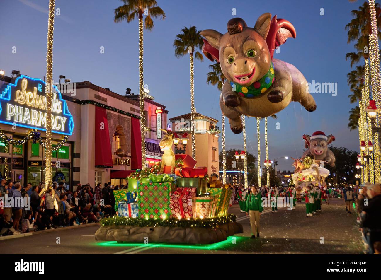 Universal's Holiday Parade featuring Macy's. Balloons floating through