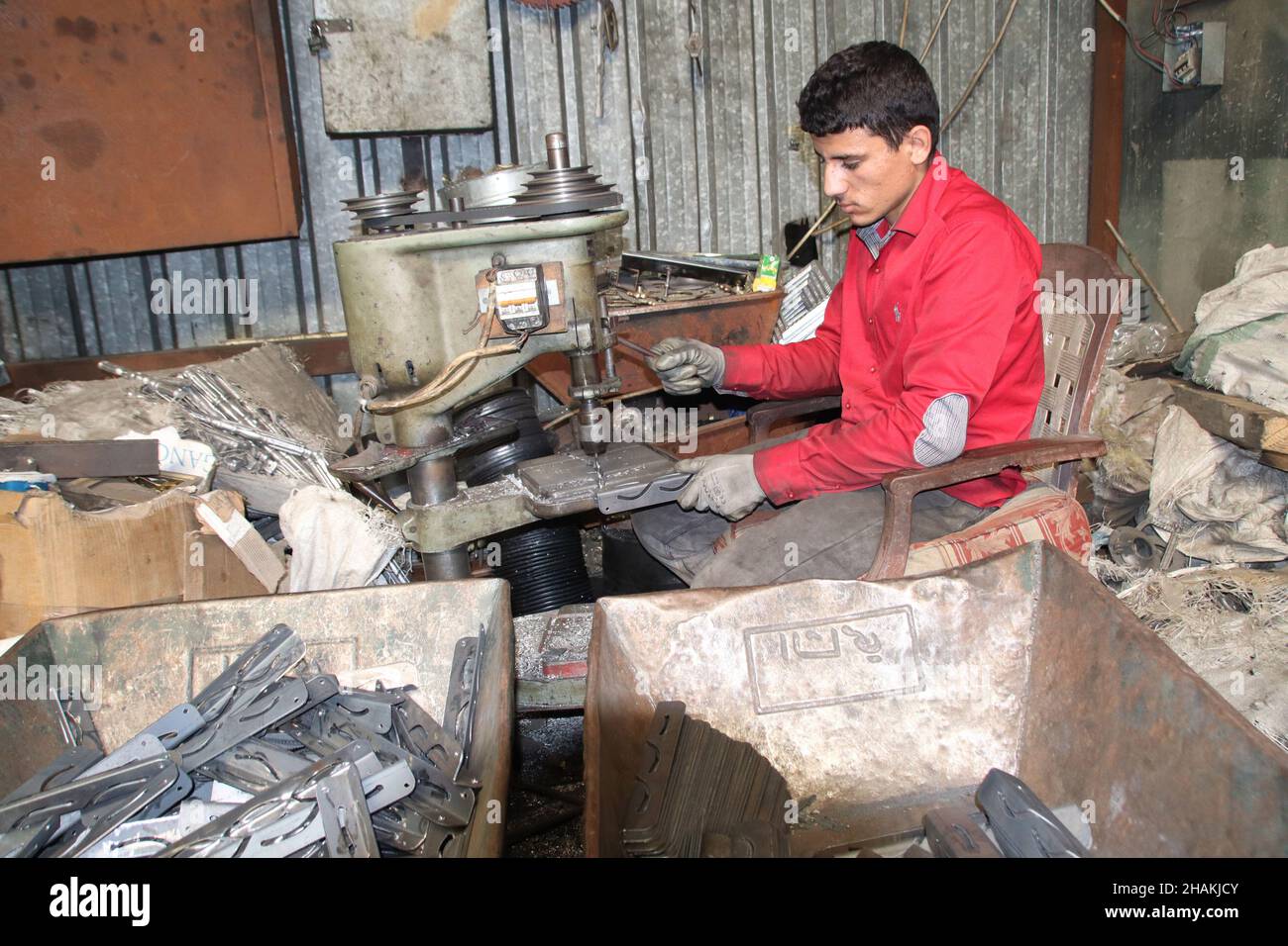 Beirut, Lebanon. 10th Dec, 2021. A worker makes a woodburning heater