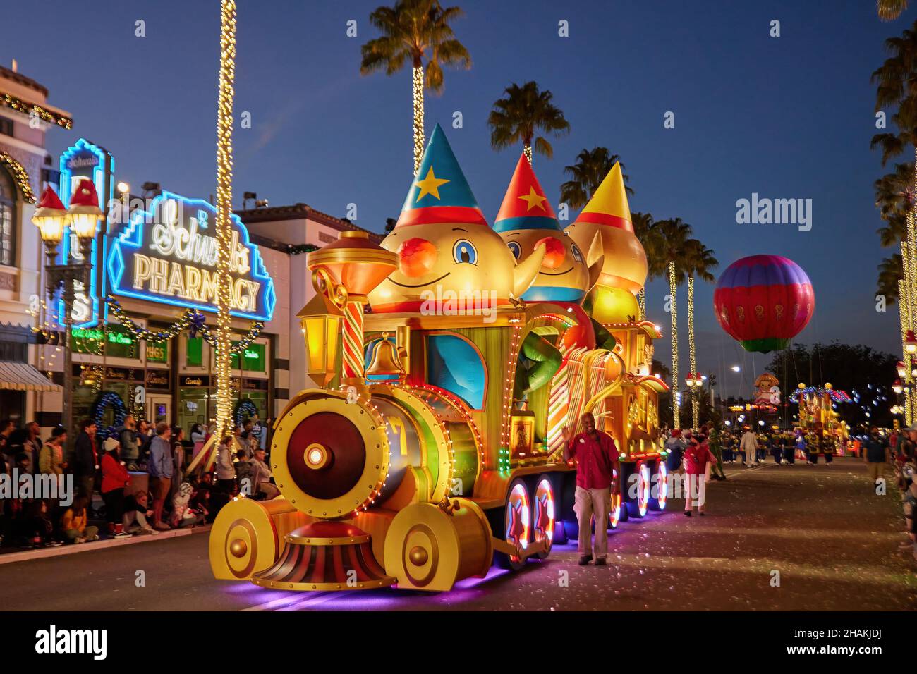 Universal's Holiday Parade featuring Macy's. Balloons floating through