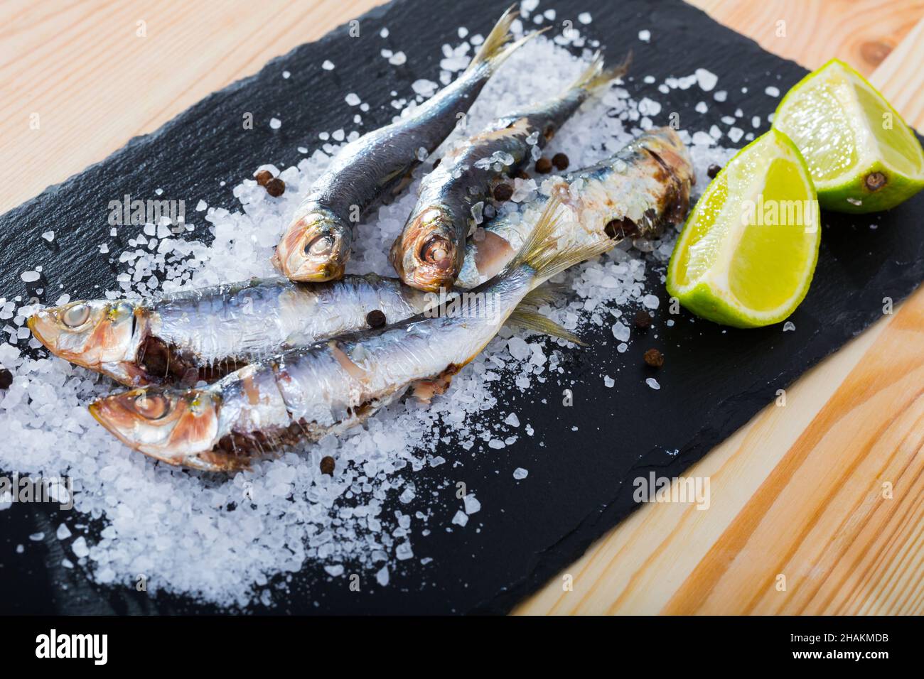 Slate of baked in oven anchovies Stock Photo Alamy