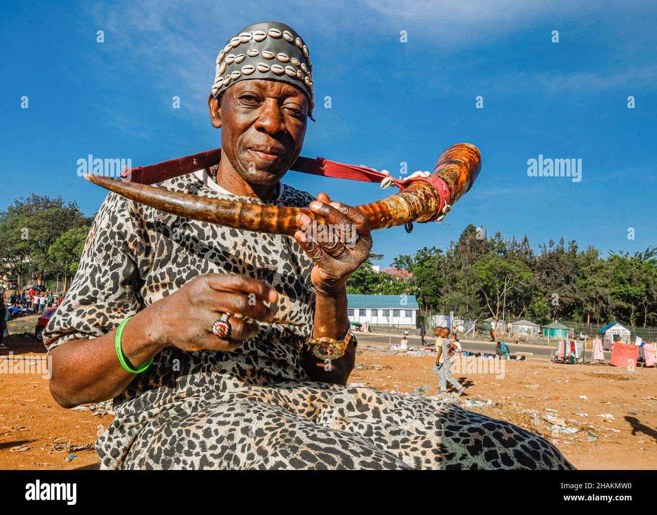 Nairobi, Kenya. 11th Dec, 2021. A young female model dressed in a colorful  outfit poses by the streets during the Mr. and Mrs. Kibera modeling contest  in Kibera Slums. Young models and