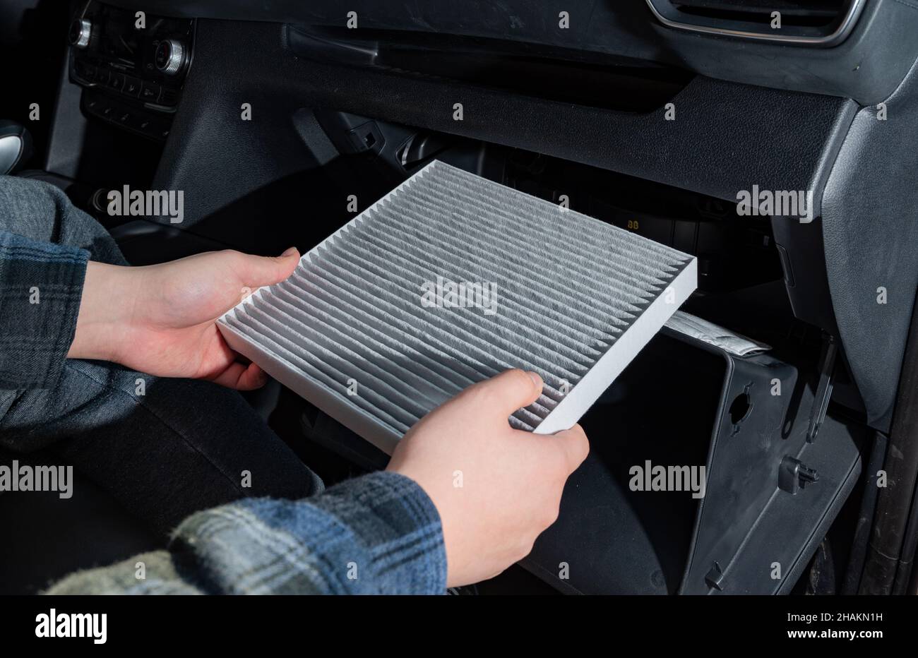 Changing the air filter inside the car. car maintenance Stock Photo Alamy