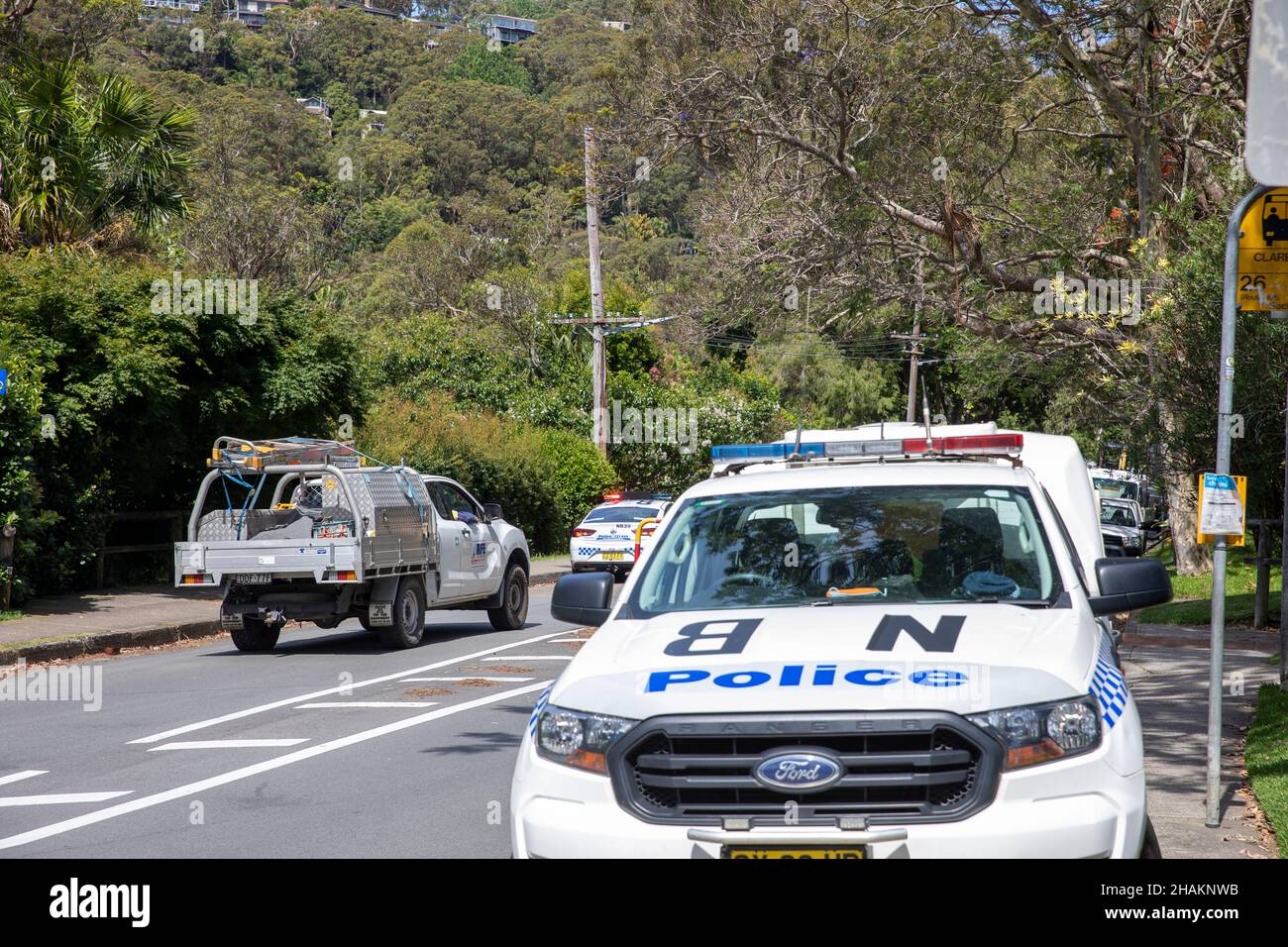 Sydney police officers attending a road traffic accident in North Sydney, pictured the two police vehicles that attended the scene,Sydney,Australia Stock Photo