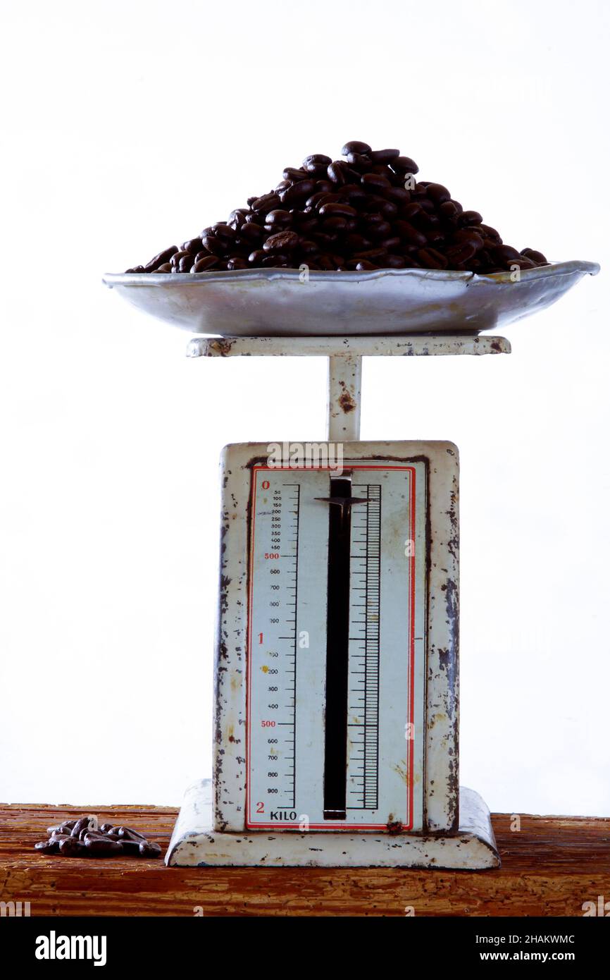 Coffee Beans On A Balance Scale. Stock Photo, Picture and Royalty