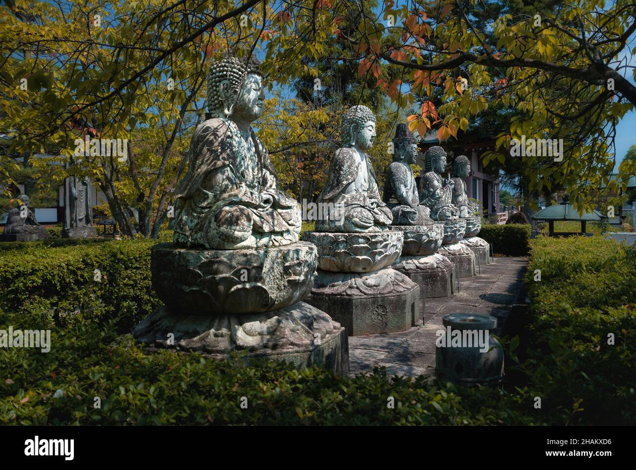 Buddha statues in a garden in Kyoto, Japan Stock Photo