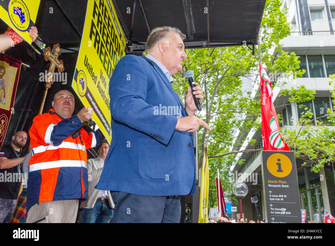 The World Wide Freedom Day Rally, held in Sydney, Australia on 20 November 2021 to protest coronavirus restrictions and lockdowns. The event commenced in Hyde Park and was followed by a protest march through city streets and speeches and performances in Martin Place. Pictured: Craig Kelly of the UAP, United Australia Party (left) addresses the crowd in Martin Place with the 'Aussie Cossack', Simeon Boikov. Stock Photo