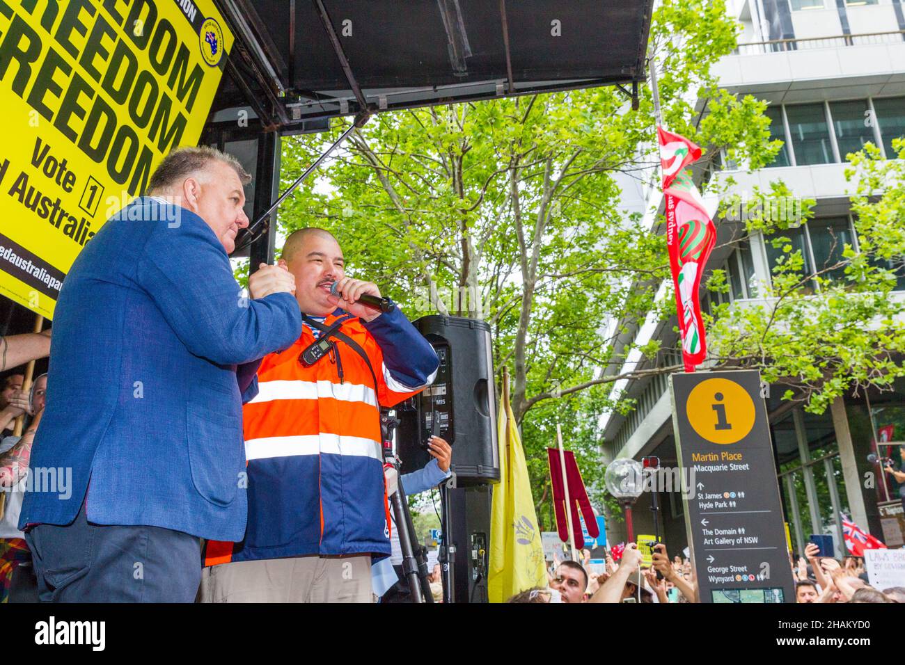 The World Wide Freedom Day Rally, held in Sydney, Australia on 20 November 2021 to protest coronavirus restrictions and lockdowns. The event commenced in Hyde Park and was followed by a protest march through city streets and speeches and performances in Martin Place. Pictured: Craig Kelly of the UAP, United Australia Party (left) addresses the crowd in Martin Place with the 'Aussie Cossack', Simeon Boikov. Stock Photo