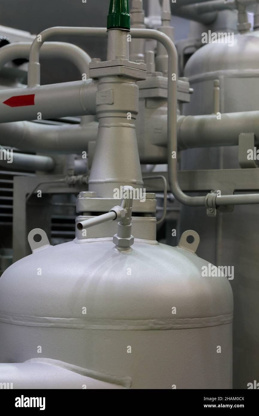 Modern industrial refrigeration equipment. Steel tanks and pipes