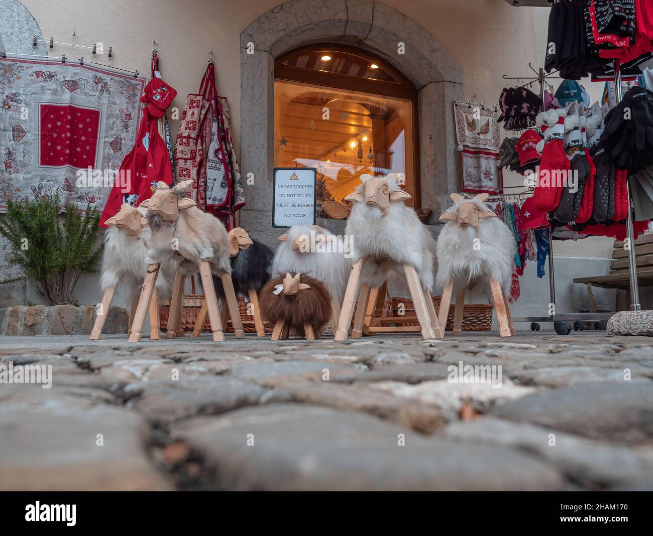 Gruyeres, Switzerland - November 23, 2021: Sheep figurines in front of a souvenir shop in Gruyeres Stock Photo