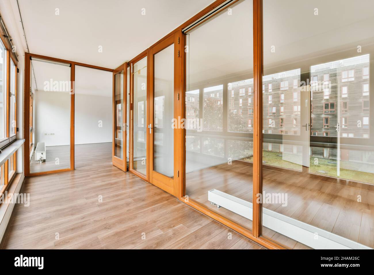 View of A Guide to Floor-to-Ceiling Windows - The Spruce