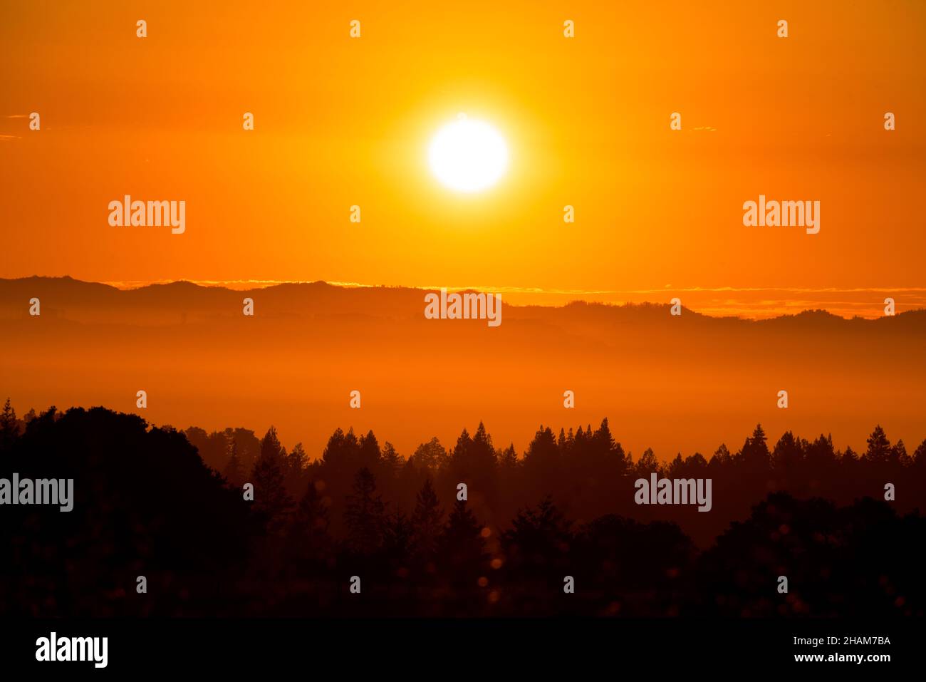 Orange sunrise over the mountains in Sonoma County, California, USA Stock Photo