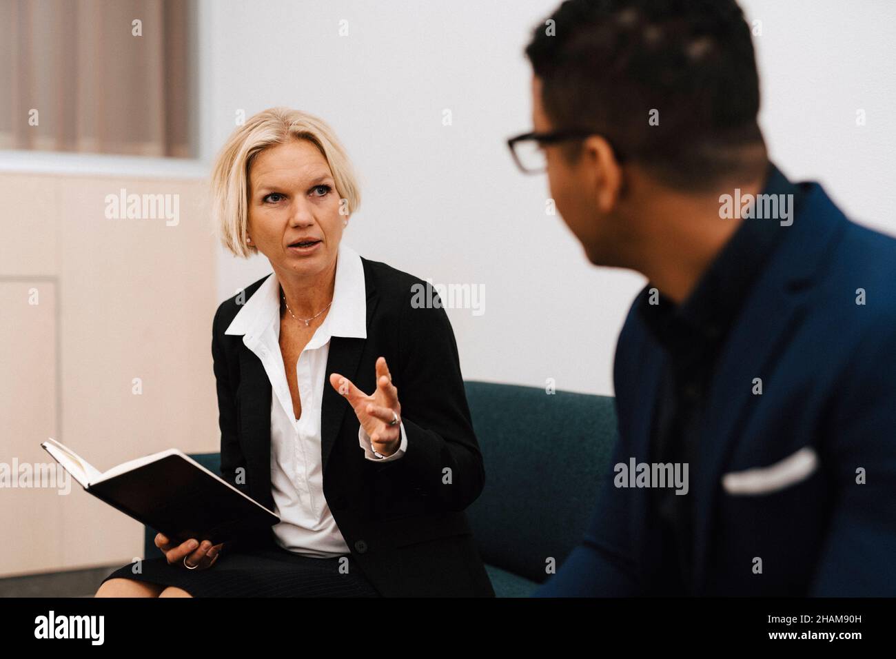 Coworkers having meeting Stock Photo