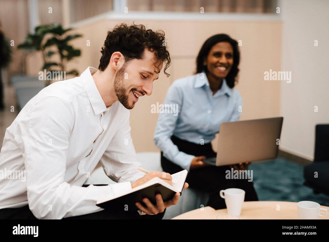 Coworkers having meeting Stock Photo