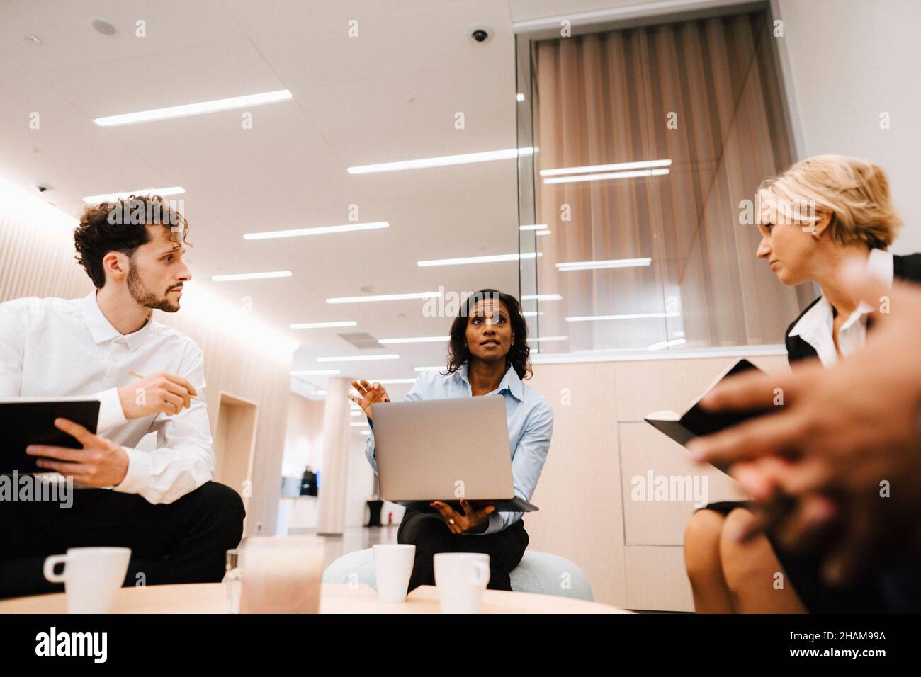 Coworkers having meeting Stock Photo