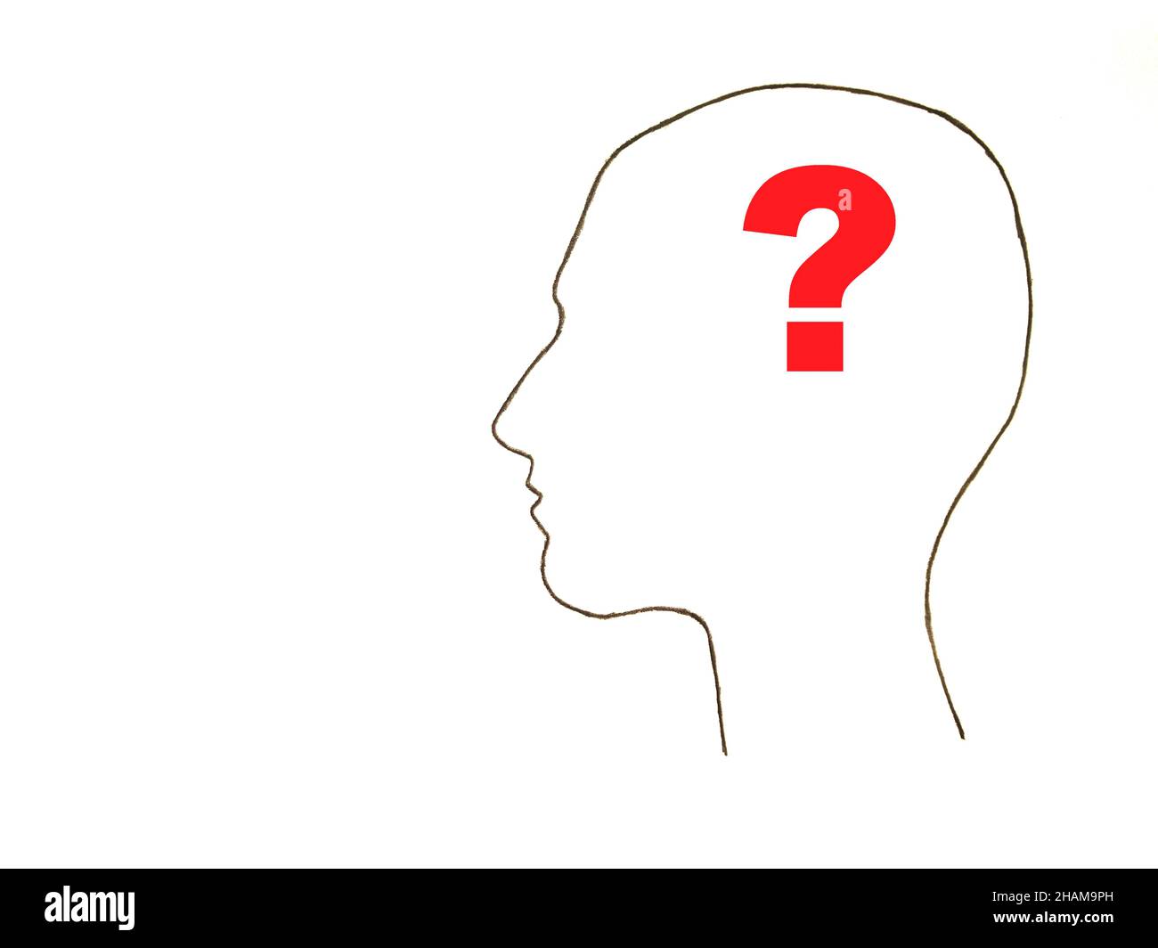 Head silhouette with red question mark instead of the brain Stock Photo