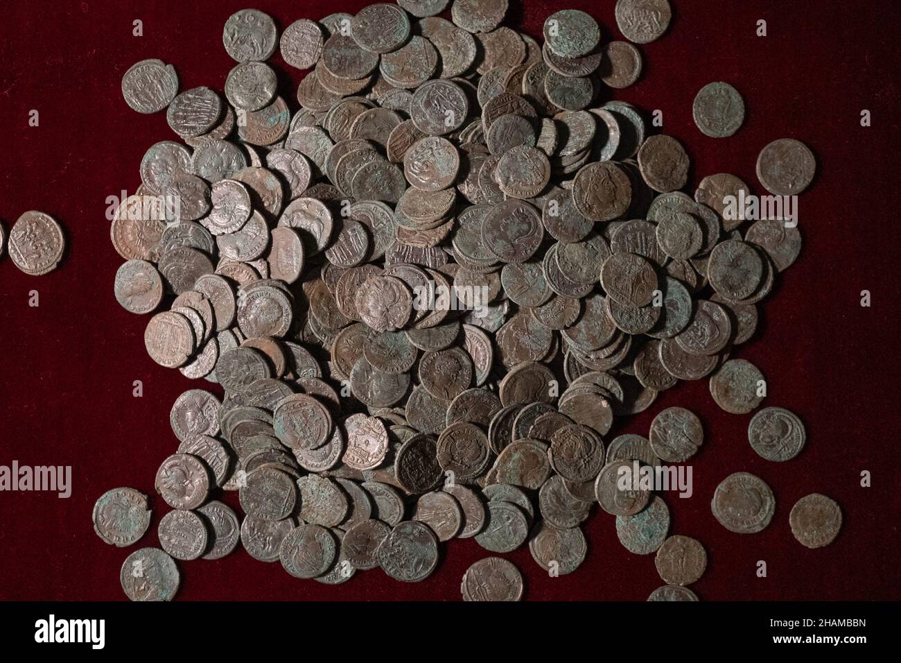London, UK. 14th December, 2021. A cache of Roman coins found by a ...