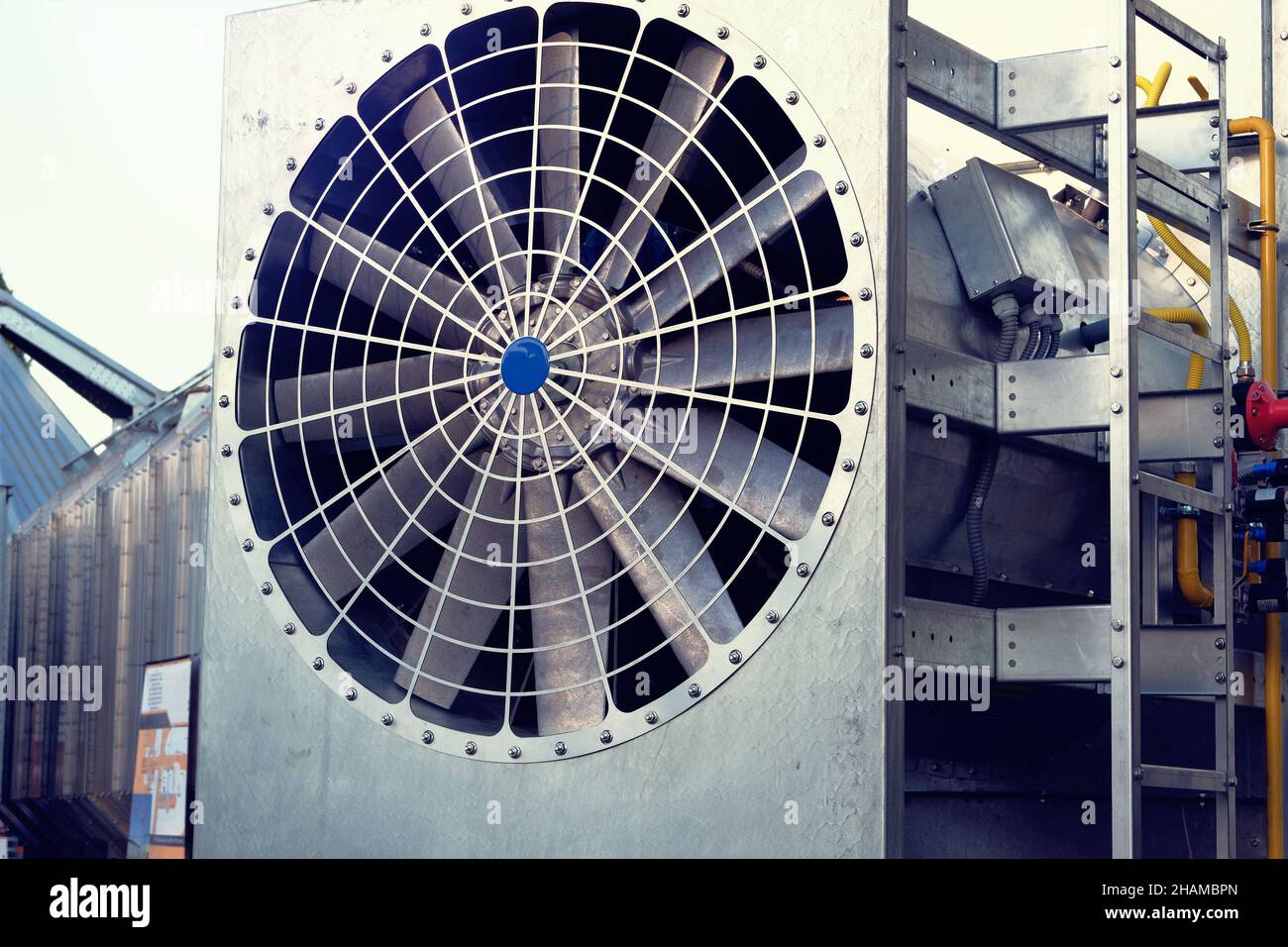 Industrial fan turbine background. Refrigeration temperature conditioning system. Air conditioner condenser fan units battery set climate control. Stock Photo