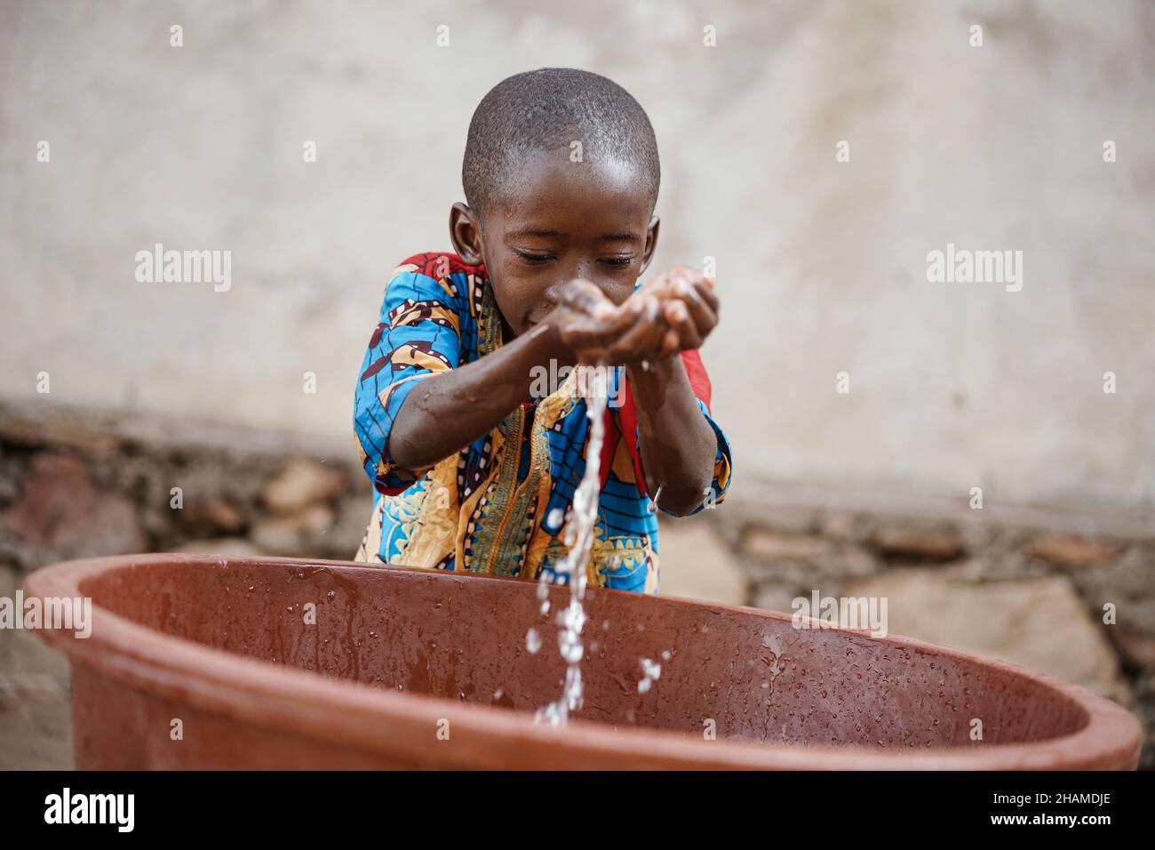 Mali boy water hires stock photography and images Alamy